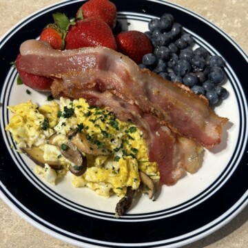 Eggs, bacon, strawberries, and blueberries!